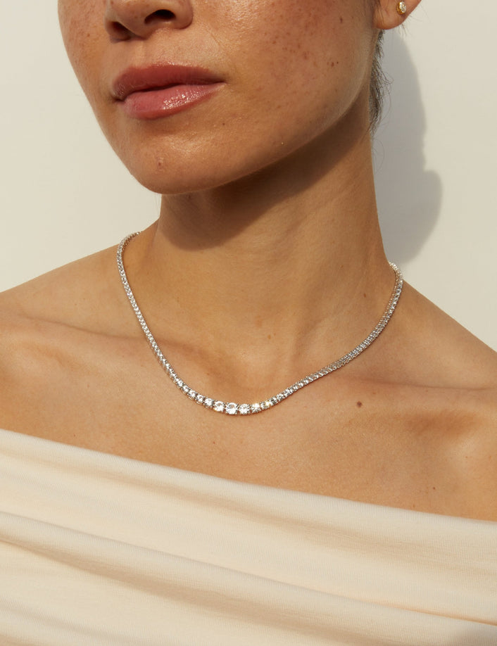 Model woman wearing diamond necklace 