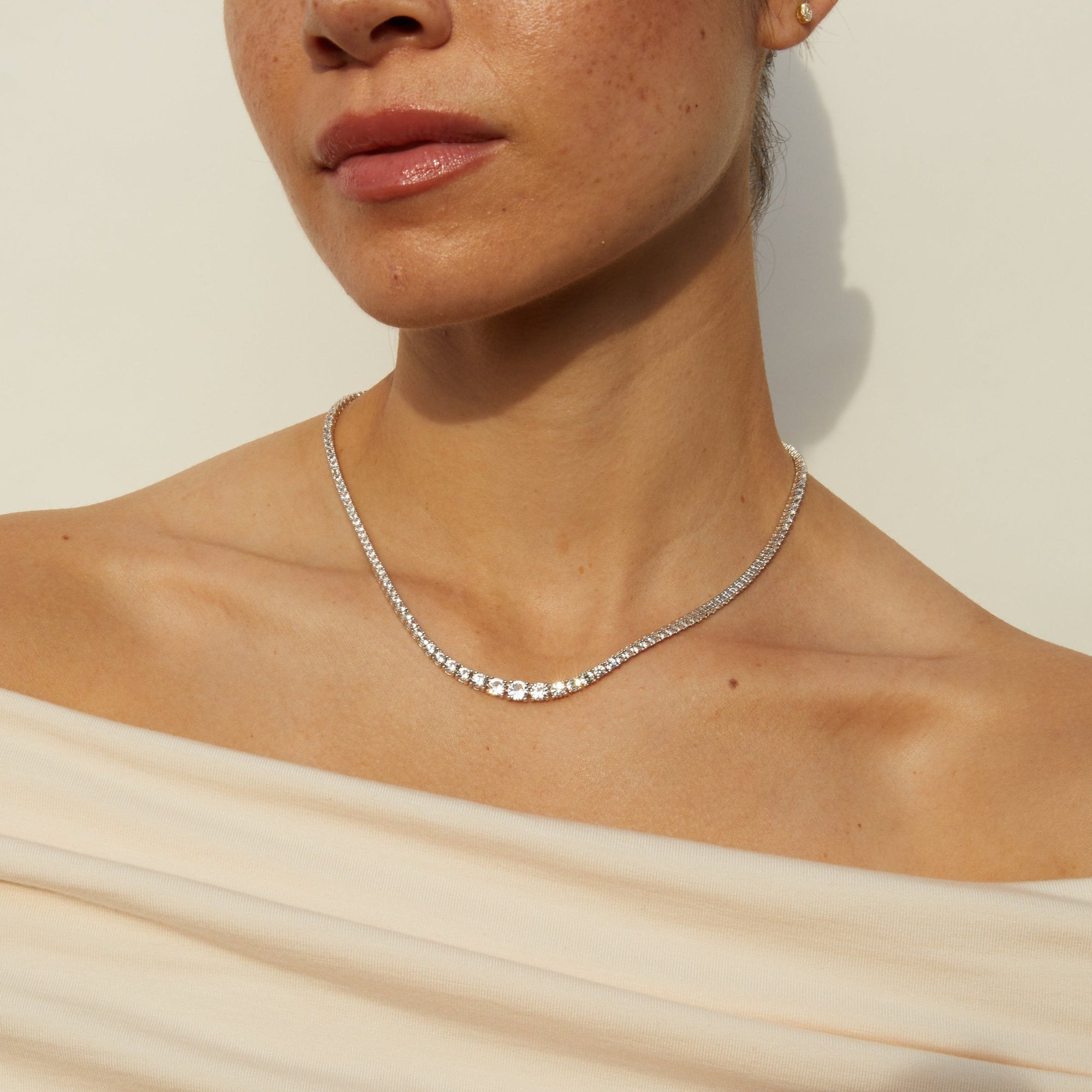 Model woman wearing diamond necklace 