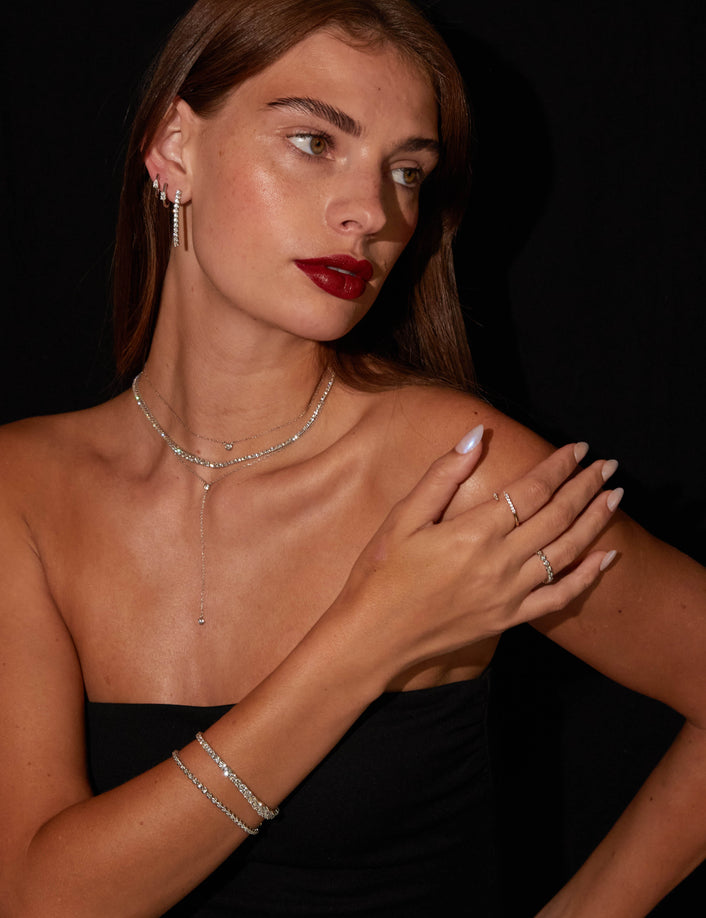 Model woman wearing various jewelry 