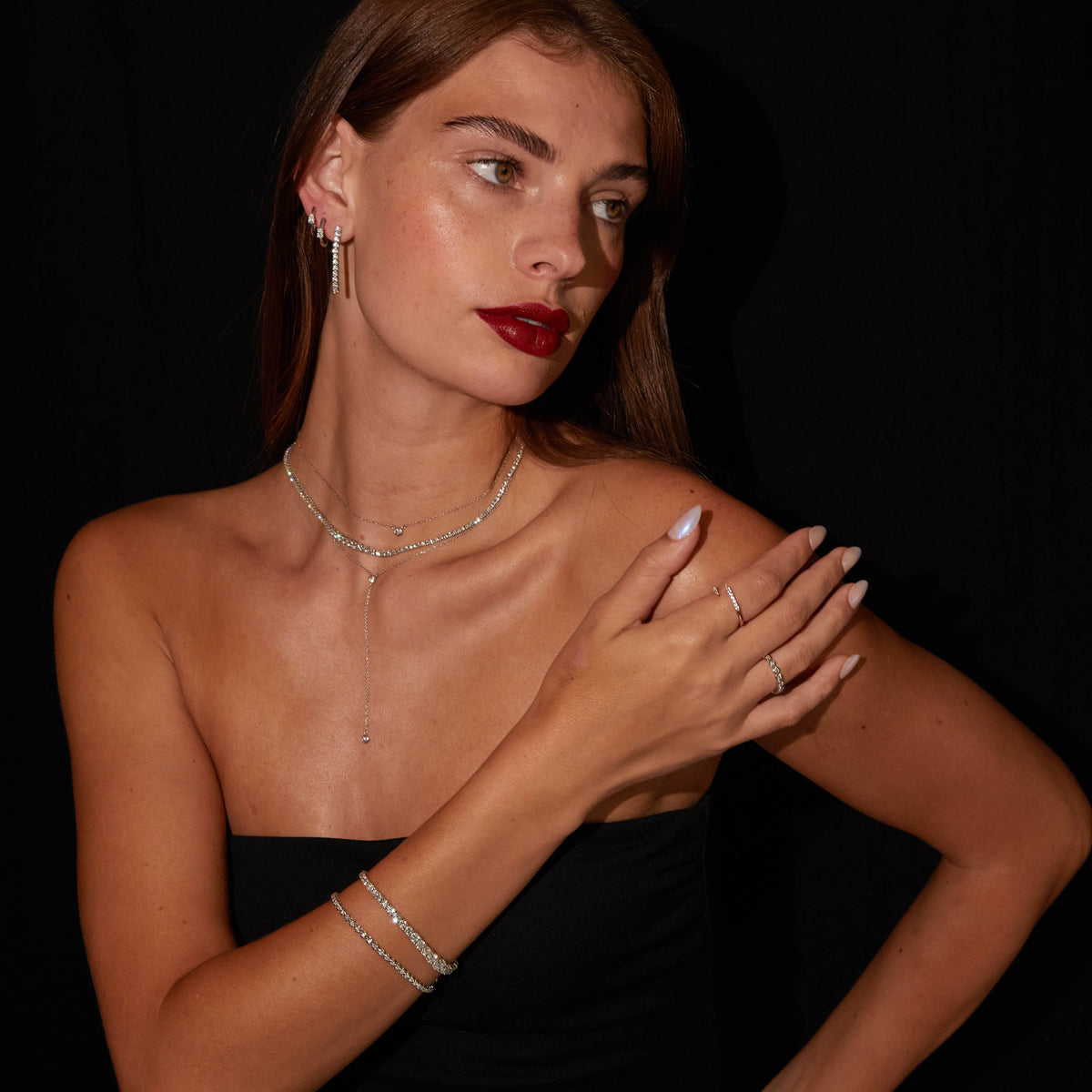 Model woman wearing various jewelry 