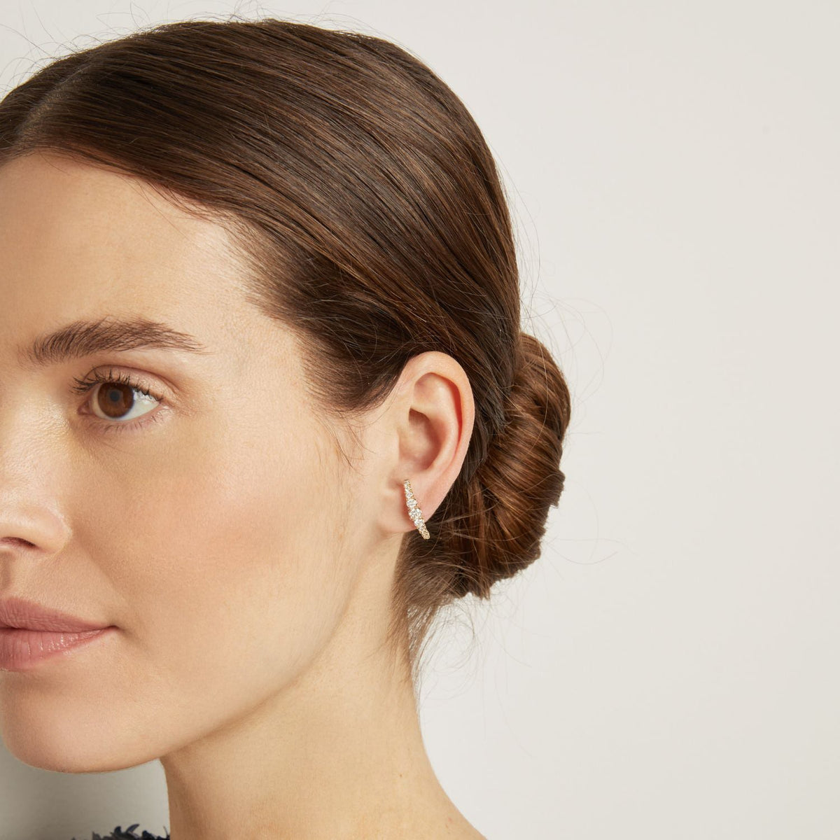 Model. Close up of woman wearing hoop earring
