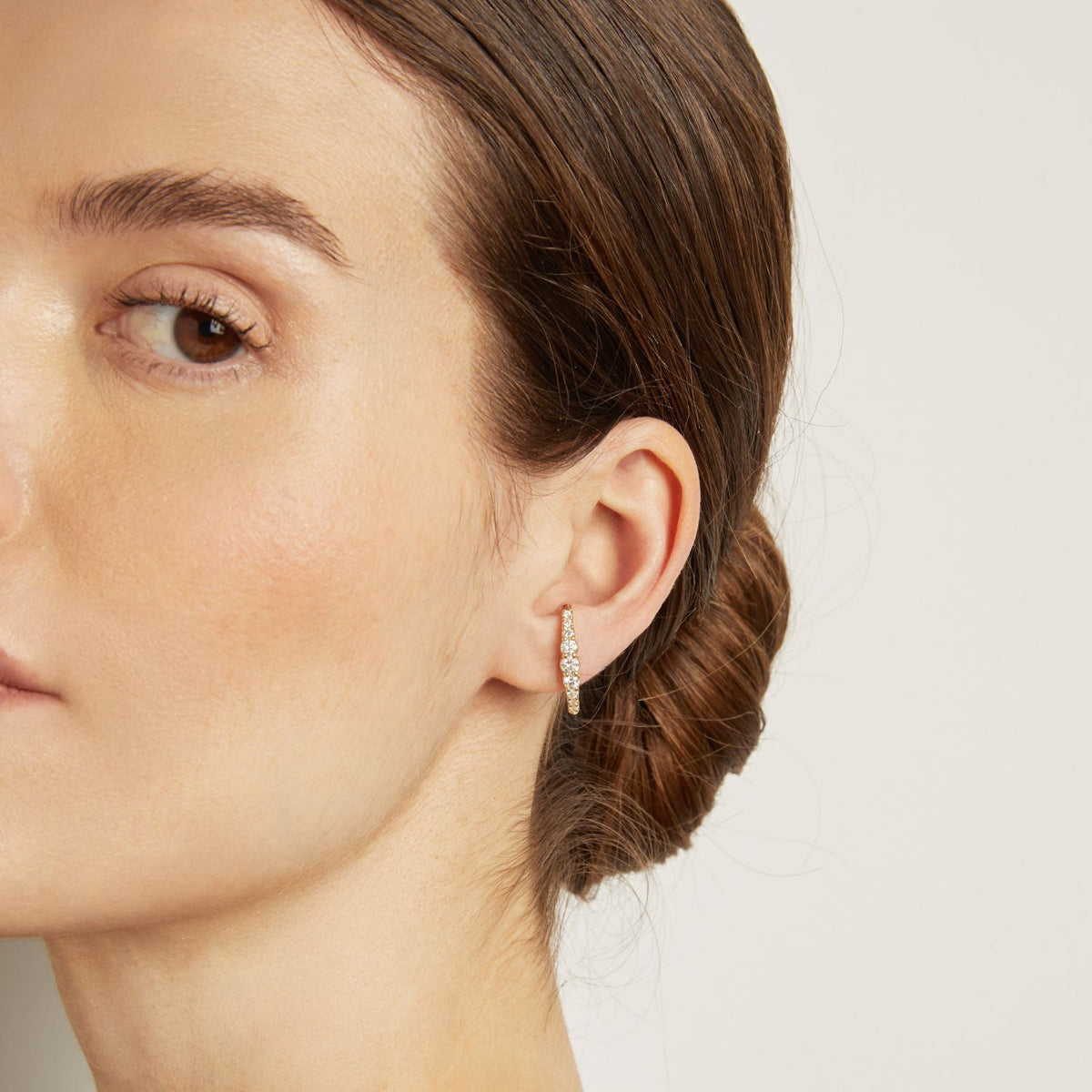 Model. Close up of woman wearing hoop earring