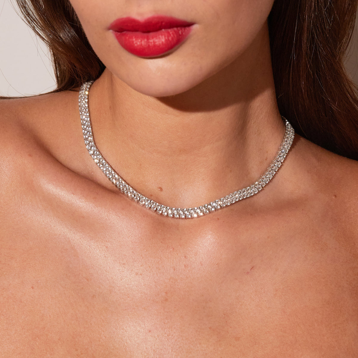 Model woman wearing diamond necklace 