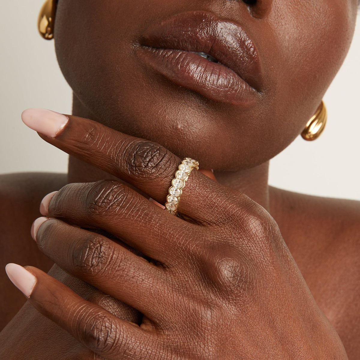 Model. Woman wearing diamond ring 