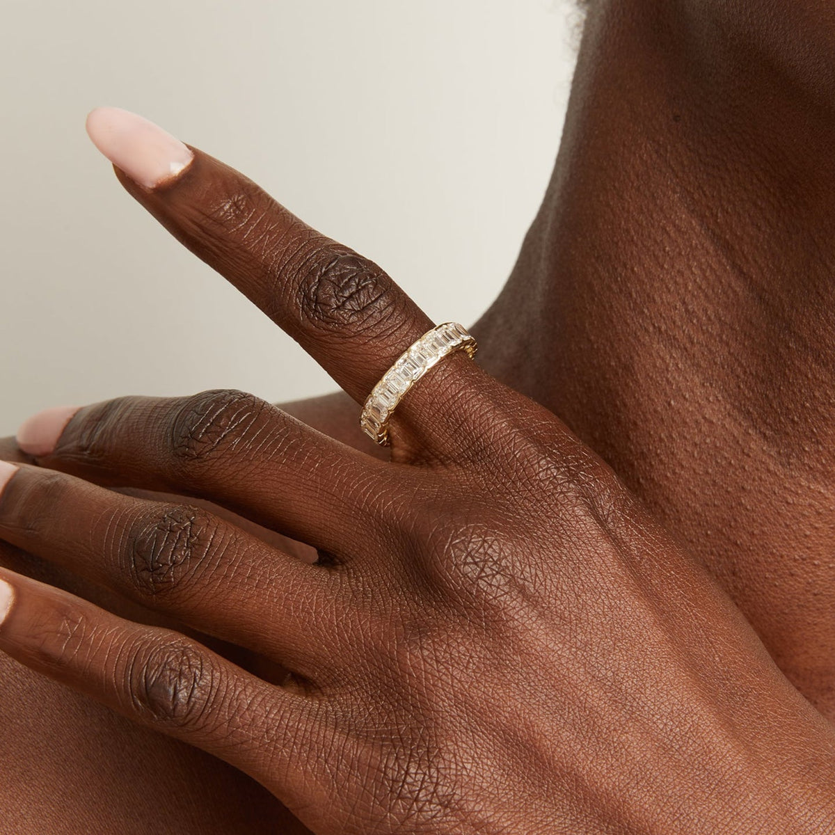 Model. Close up of woman wearing diamond ring 