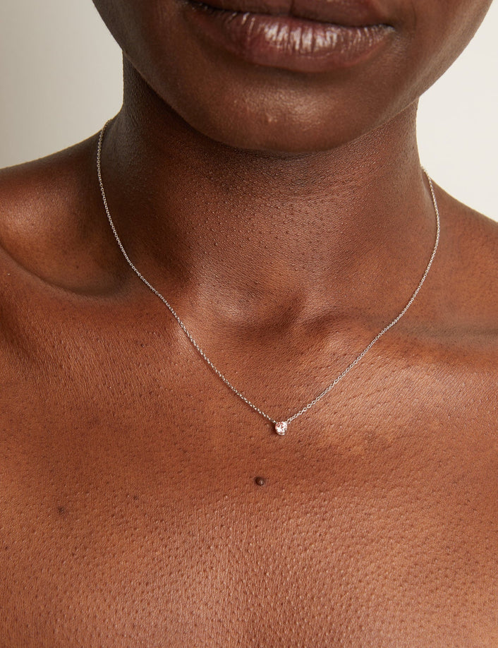 Model. Woman wearing delicate chain necklace