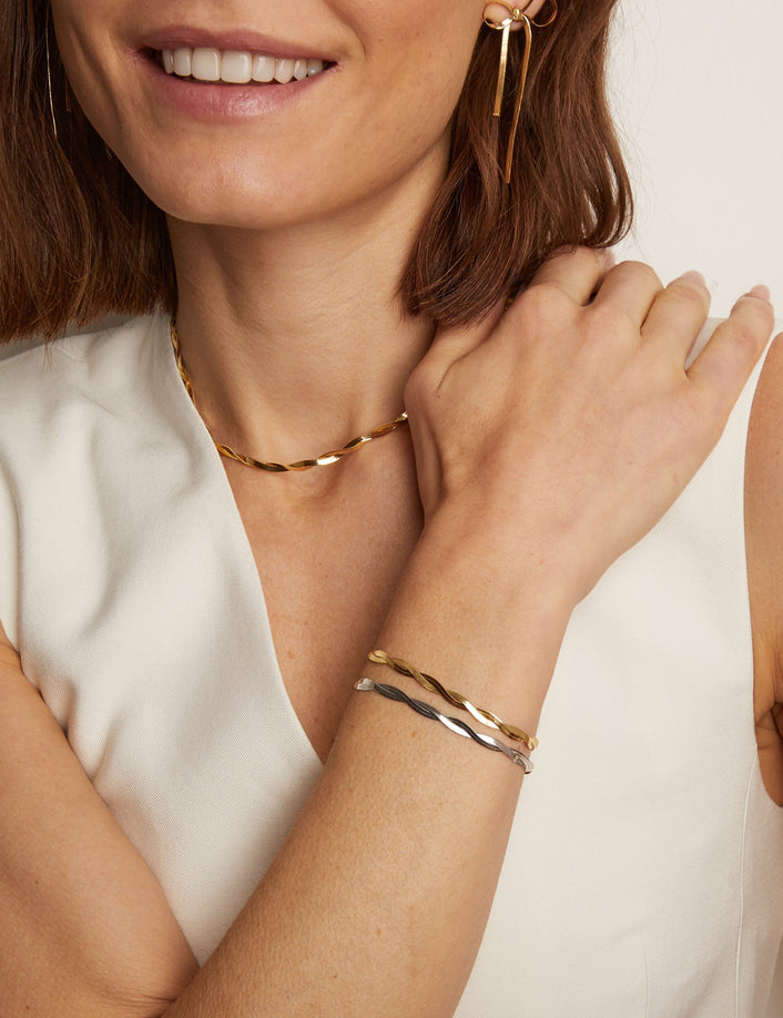 Model.  Woman wearing twist necklace 