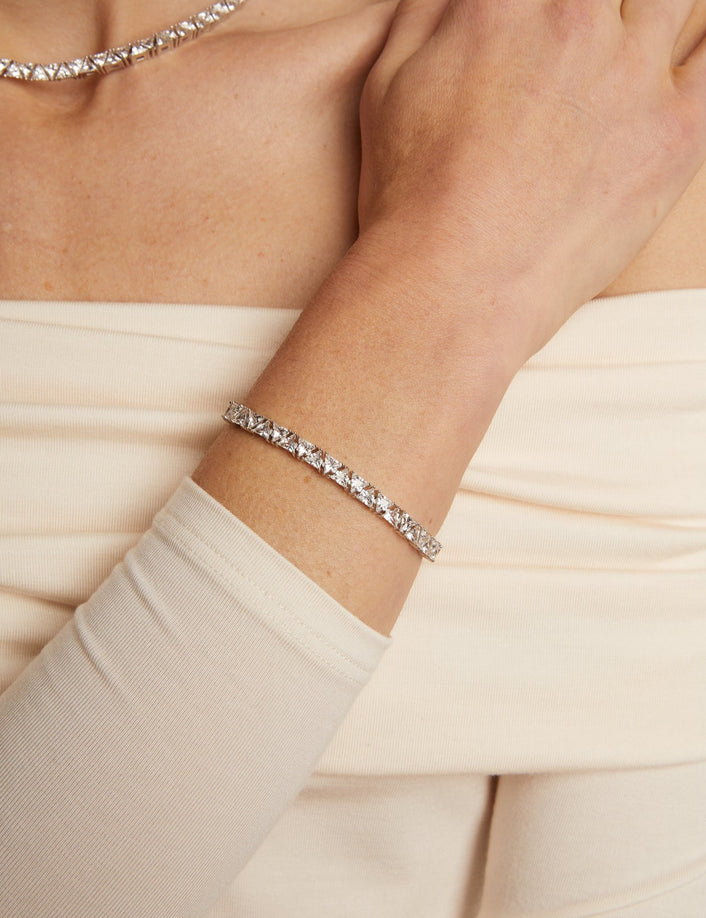Close up of a woman wearing diamond bracelet 