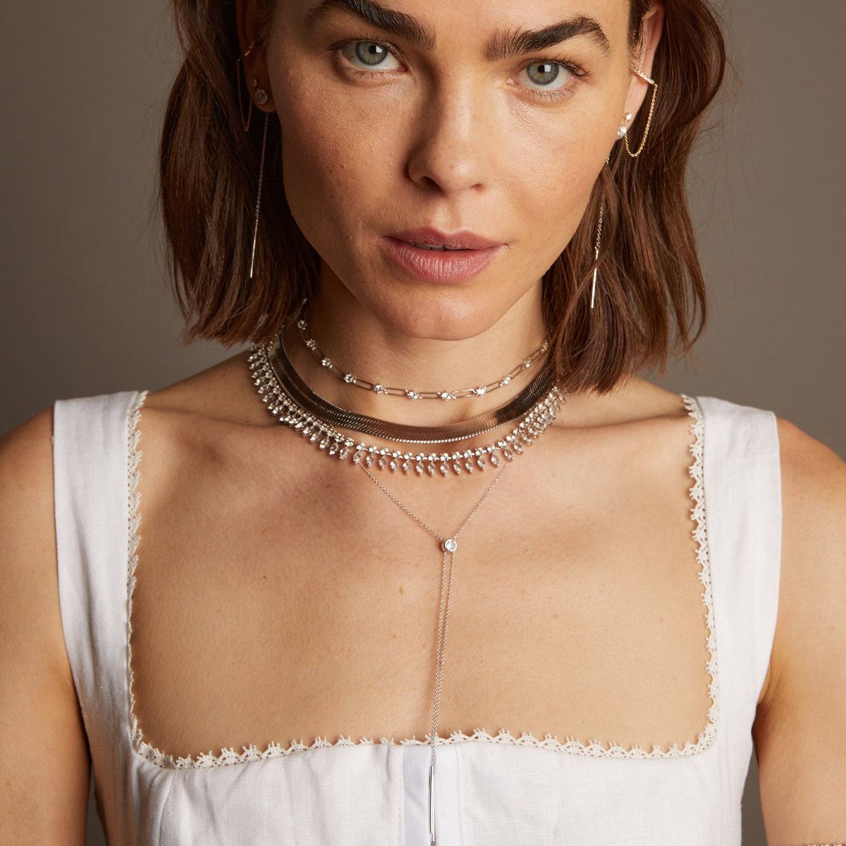 Model. Woman wearing various jewelry