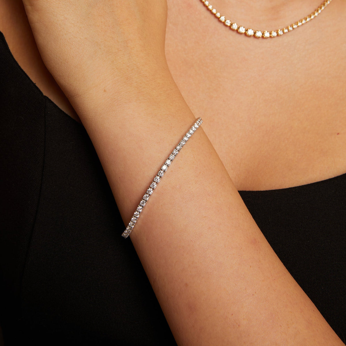 Model. Silver bracelet on a person's wrist with a blurred background