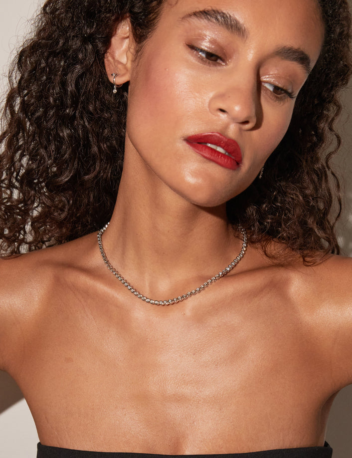 Model.  woman wearing diamond necklace 