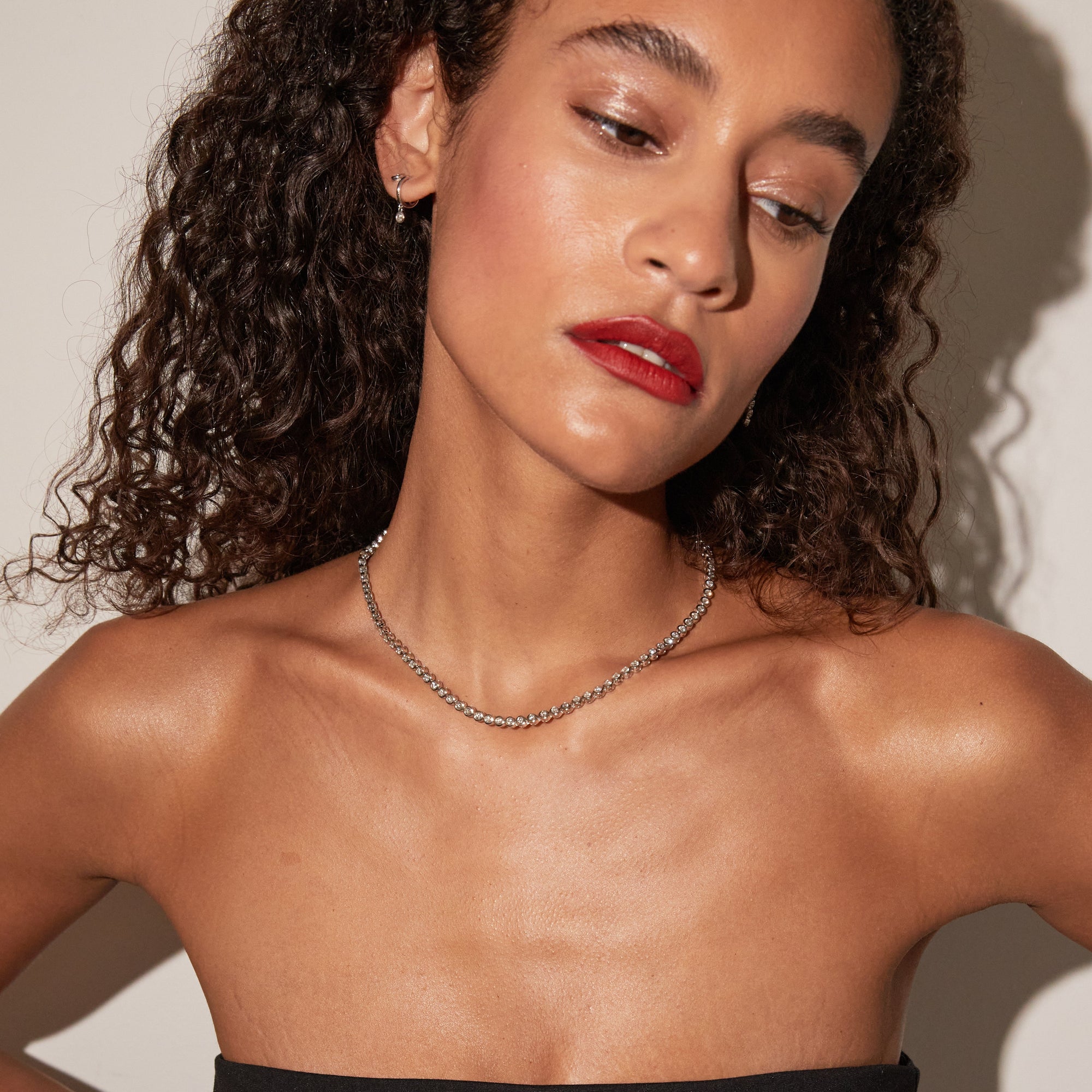 Model.  woman wearing diamond necklace 