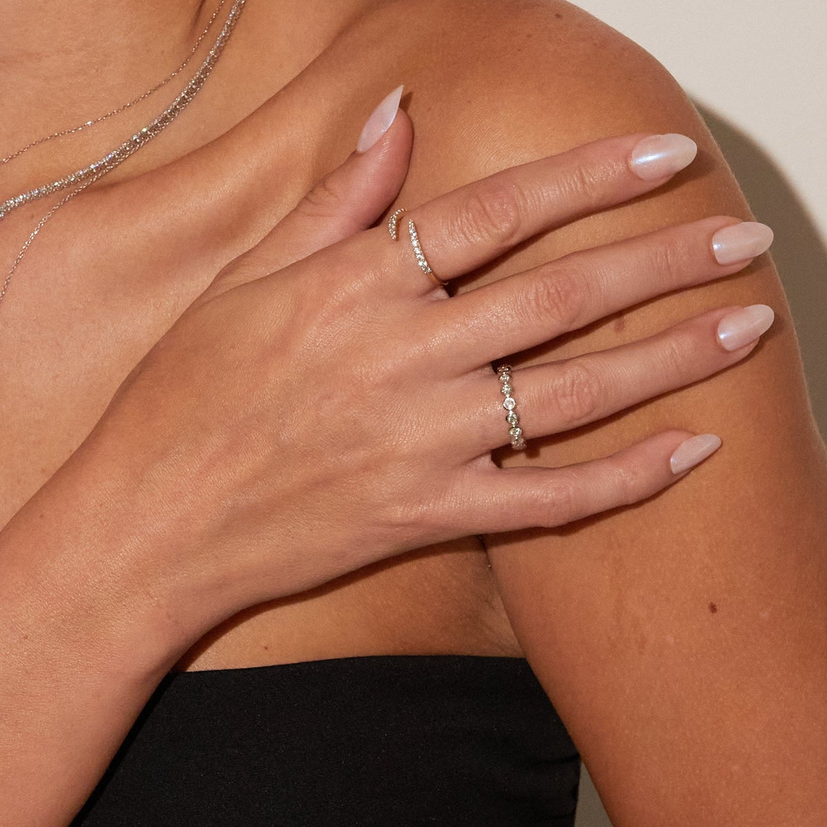 Model. Close up of woman wearing diamond ring 