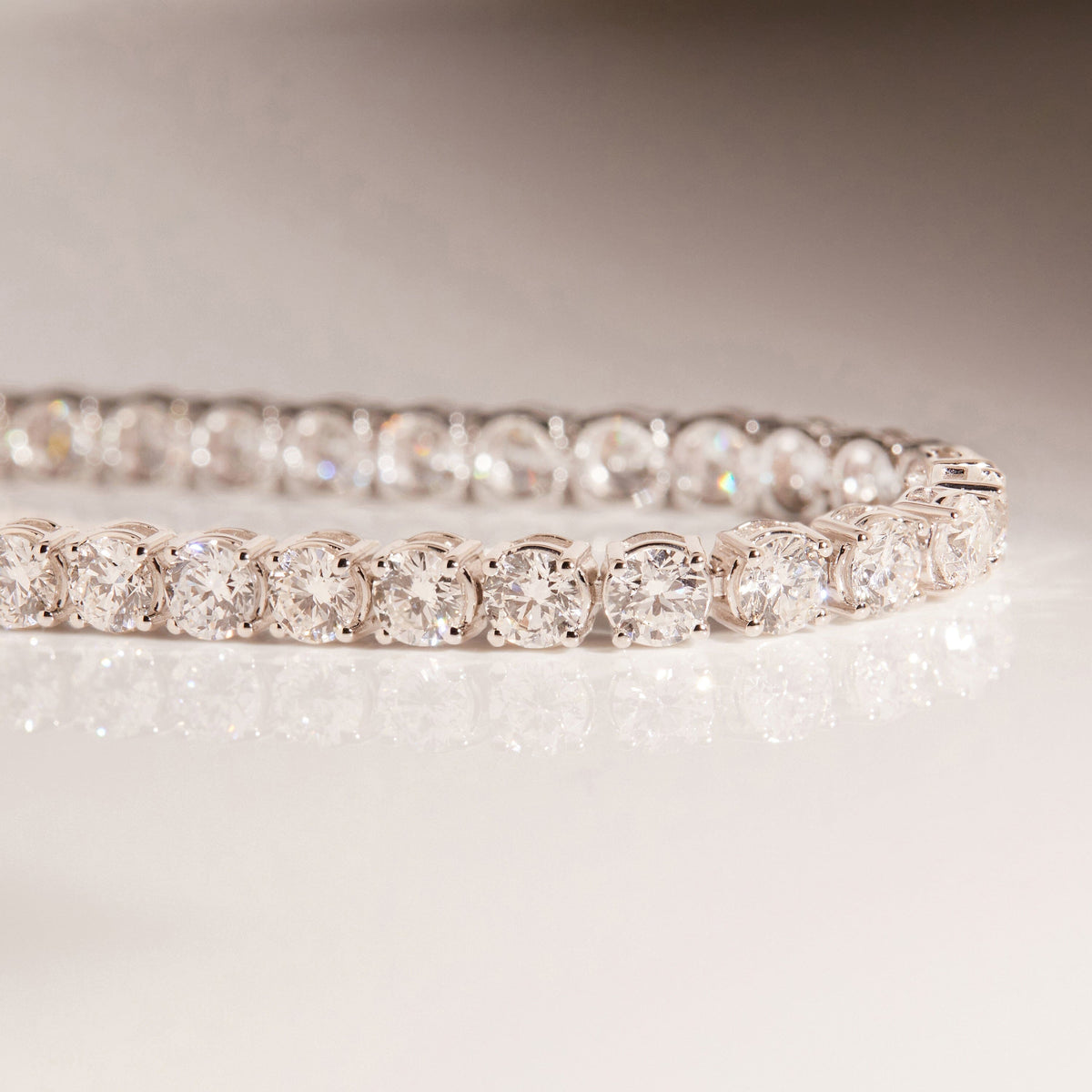 Flatlay Model close up of diamond chain on a white surface 