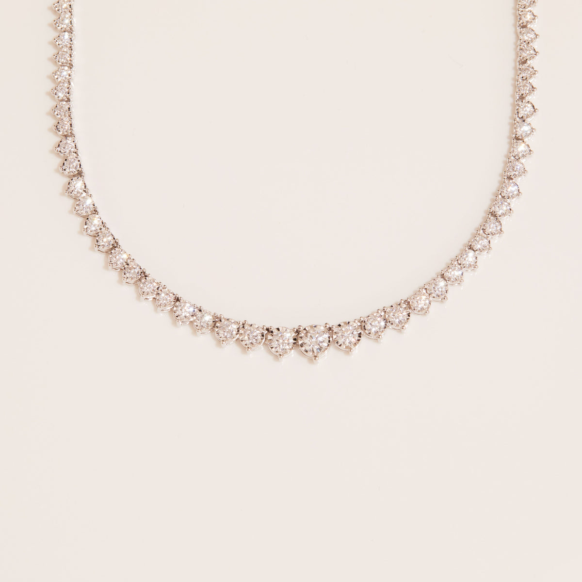Flatlay Model. Tennis necklace on white background
