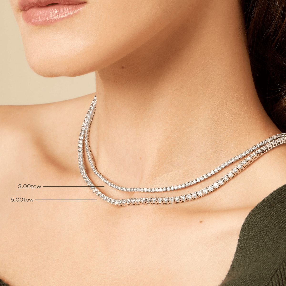 Lifestyle Model "Woman wearing two layered diamond tennis necklaces showing 3.00tcw and 5.00tcw sizes