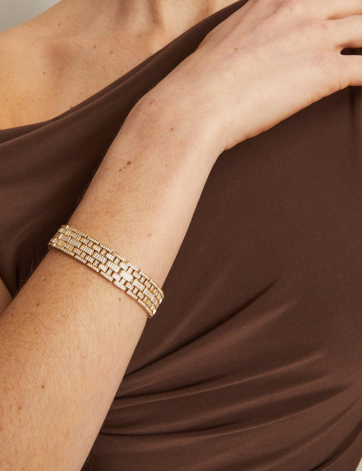 Gold bracelet on a person