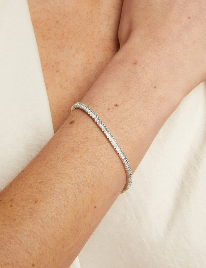 Silver bracelet on a person