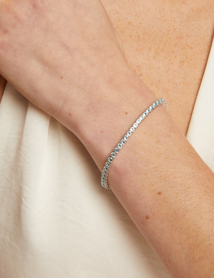 Silver bracelet on a person