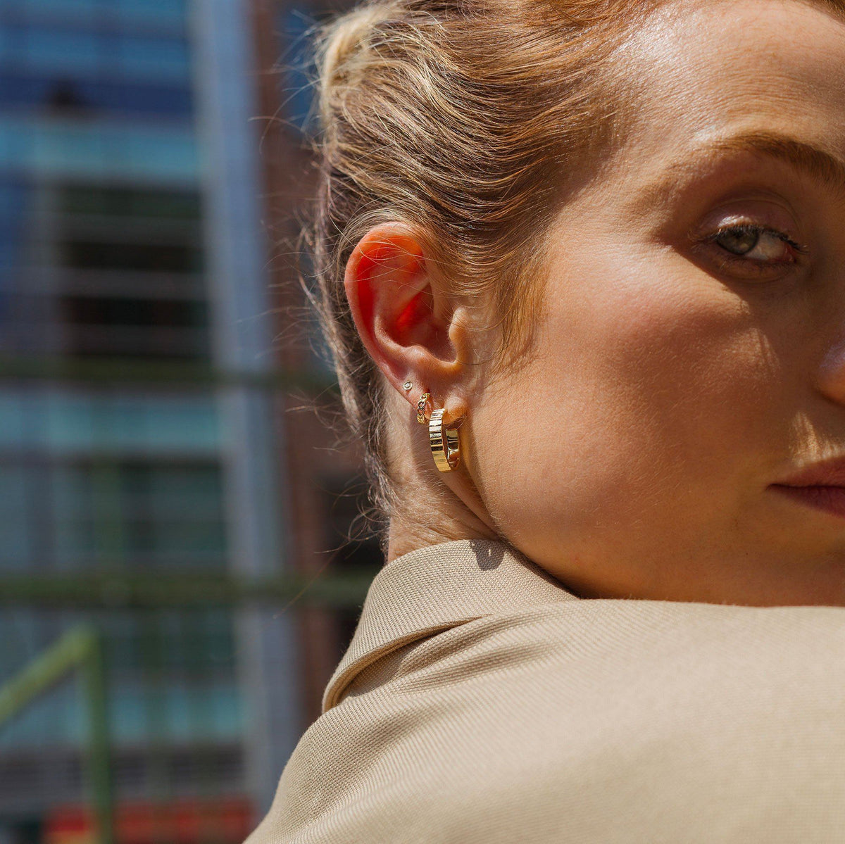 Infinity Heart Huggie Earrings Lifestyle Model
